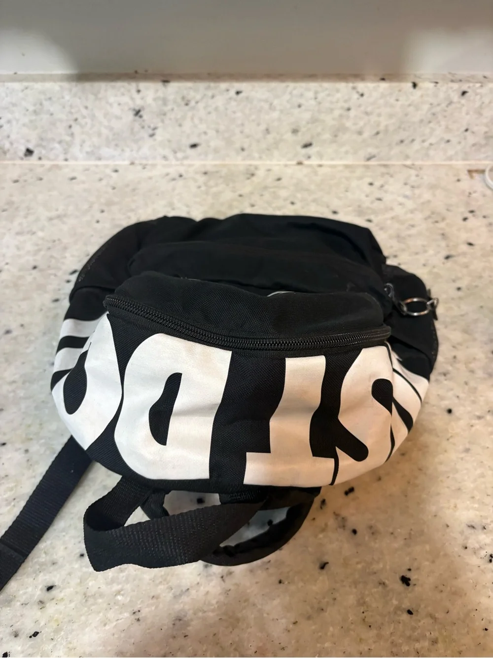 Nike Black and White Mini Backpack with Swoosh Accent